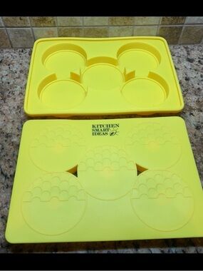 Kitchen Smart yellow silicone mold tray. Five large circular cavities for snacks